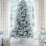 Unlit flocked Christmas tree